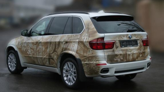 Illustration for article titled Ridiculous Airbrushed BMW X5 Is A Truly Russian Creation